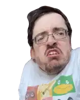 a man with glasses and a beard is wearing a frog shirt .