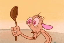 a cartoon character is holding a wooden spoon in his right hand