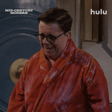 a man wearing glasses and a robe with the words mid century modern written on it