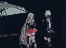 a man and a woman are dancing under an umbrella