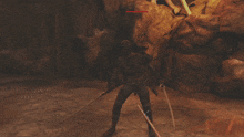 a person holding a sword in a video game with a waterfall behind them