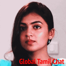 a close up of a woman 's face with the words global tamil chat written in red