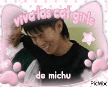 a picture of a man with the words viva las cat girls de michu written on it