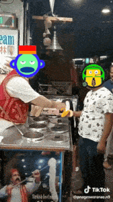 a man is serving a banana to another man at a turkish ice cream stand