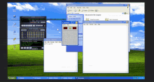 a screenshot of a windows xp computer with a notepad app open