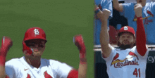 two cardinals baseball players with their arms in the air celebrating