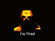 a picture of a skull with the words i 'm tired underneath it