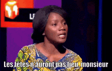 a woman says les fetes n'auront pas lieu monsieur in front of a purple background