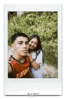 a photo of a boy and a girl with the word baby on the bottom right