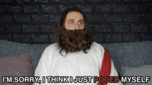 jesus is sitting on a couch and says i 'm sorry