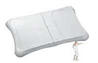 a woman is standing next to a nintendo wii balance pad