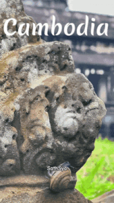 a picture of a statue with the word cambodia written above it
