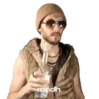 a man wearing sunglasses and a fur vest is holding a bottle with the word mcdh on the bottom right