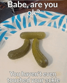 two pickles on a paper plate with the words babe are you ok