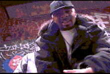 a pixelated image of a man wearing a hat and a jacket with the letters ny on it