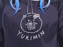 a person wearing a hoodie that says yukimin on the front