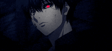 a close up of a person with red eyes in the dark