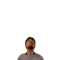 a man with glasses and a green cross on his head