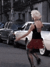 Woman-hopping Jumping GIF - Woman-hopping Jumping 1987-film-whos-that-girl GIFs