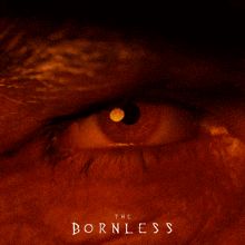 a close up of a person 's eye with the words " the bornless " above it