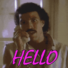 a man with a mustache is talking on a phone and the words hello are visible