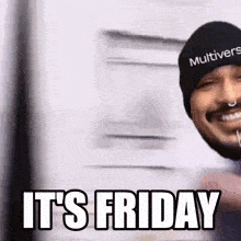 a man wearing a beanie that says it 's friday is smiling .