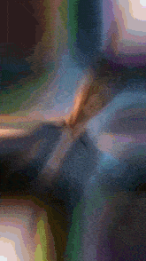 a blurred image of a person 's face with the word s on the bottom