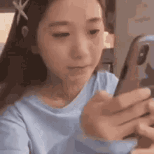 Looking At Phone Crying Rethinking Her Life GIF - Looking At Phone Crying Rethinking Her Life Inverno2009 GIFs