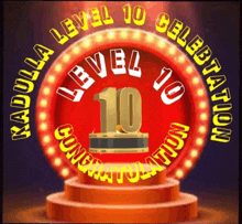 a sign that says level 10 celebration with a podium in the middle