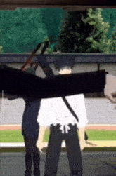 a cartoon of a man holding a large object