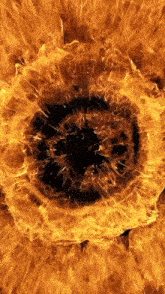 a close up of a circle of fire with a hole in the middle .