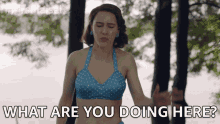 a woman in a blue bikini is asking what are you doing here