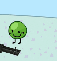 a cartoon drawing of a green ball and a white object with a black face