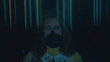 a woman 's face is obscured by the words why