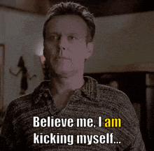 a man in a grey sweater says believe me i am kicking myself