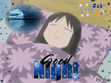 a picture of a girl sleeping with the words good night written in blue