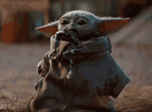baby yoda spit out frog the mandalorian cute