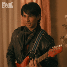 Playing Guitar Vivek GIF - Playing Guitar Vivek How To Fail As A Popstar GIFs