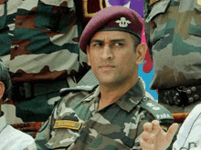 a man in a military uniform has a name tag that says m.s. dewani on it