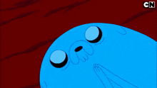 a blue cartoon character with cn on the bottom