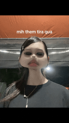 a girl with a fake mustache and the words " mih them tira qua " on the bottom right