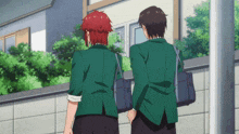 a boy with red hair is standing next to another boy with black hair
