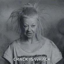 a black and white photo of a woman with the words crack is whack above her