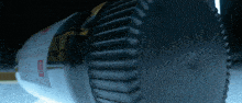 a close up of a circular saw blade with a label that says safety