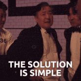 a man in a tuxedo with the words the solution is simple written below him
