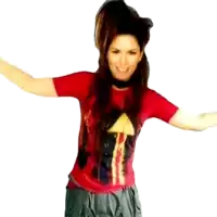 a woman in a red t-shirt with an arrow on it is dancing with her arms outstretched .