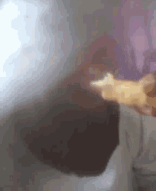 a person is smoking a cigarette in a dark room with smoke coming out of their mouth