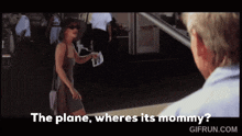 a woman talking to a man with the words the plane where 's its mommy '