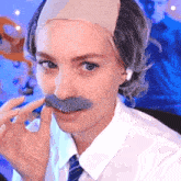 a woman wearing a wig and a fake mustache