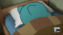 a cartoon character is sleeping on a bed with a cn logo on the bottom